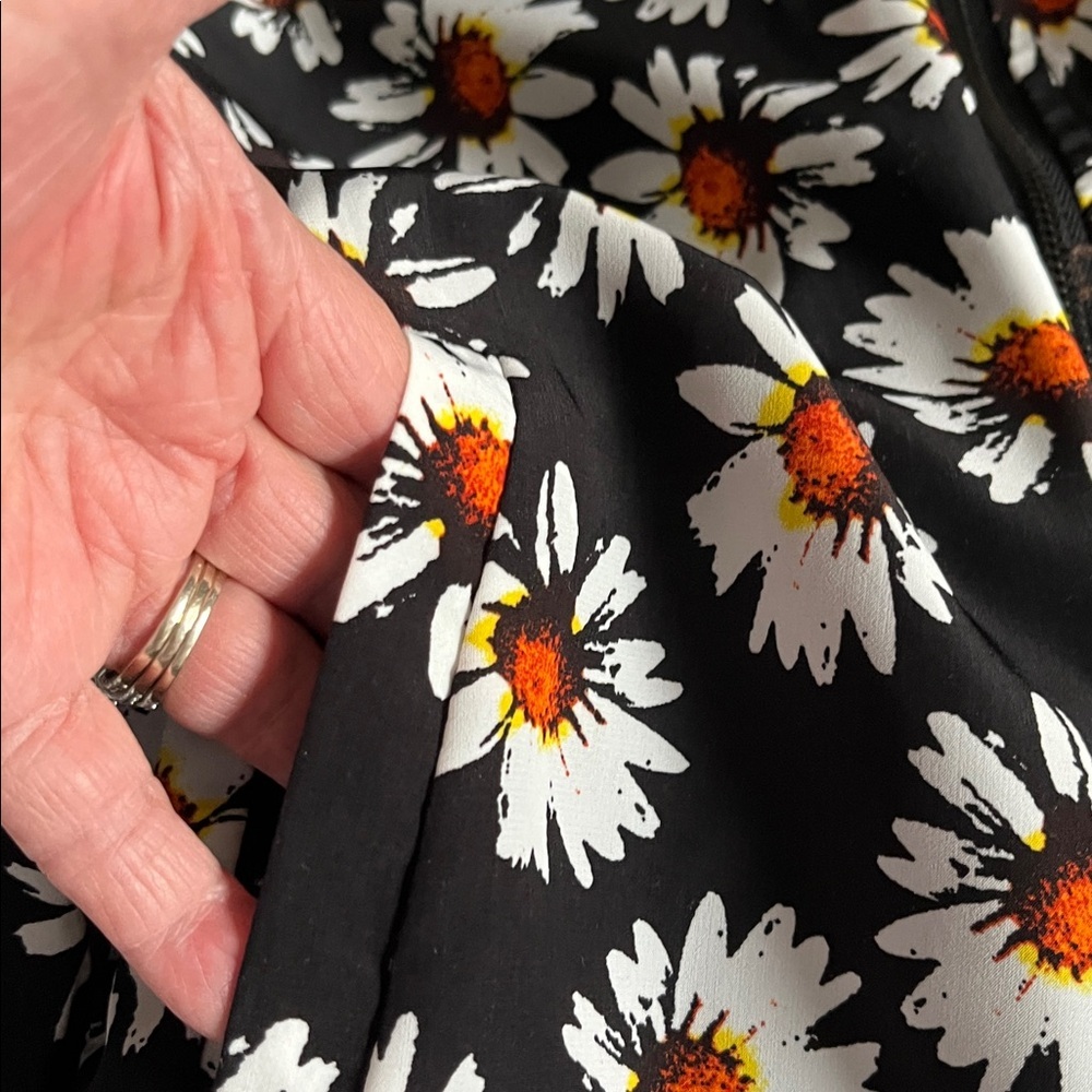 Wet Seal black jacket with white daisies. Size Small. - Picture 9 of 9